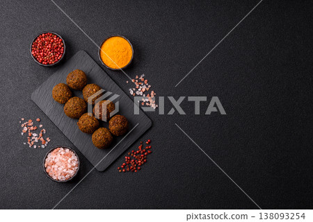 Falafel, a hearty Arabic dish made from boiled chickpeas for vegetarians. Chickpea falafel 138093254