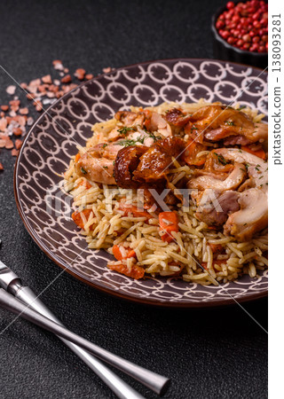 Kabsa or mandi, an Arabic dish with rice and chicken, salt, and spices. Kabsa or mandi Kabsa or mandi, an Arabic dish with rice and chicken, salt, and spices. Kabsa or mandi 138093281