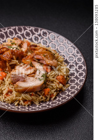 Kabsa or mandi, an Arabic dish with rice and chicken, salt, and spices. Kabsa or mandi Kabsa or mandi, an Arabic dish with rice and chicken, salt, and spices. Kabsa or mandi 138093285