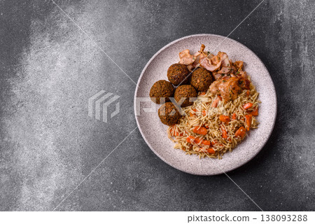 Kabsa or mandi, an Arabic dish with rice and chicken, salt, and spices. Kabsa or mandi Kabsa or mandi, an Arabic dish with rice and chicken, salt, and spices. Kabsa or mandi 138093288