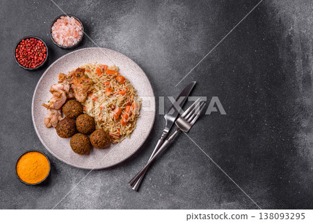 Kabsa or mandi, an Arabic dish with rice and chicken, salt, and spices. Kabsa or mandi Kabsa or mandi, an Arabic dish with rice and chicken, salt, and spices. Kabsa or mandi 138093295