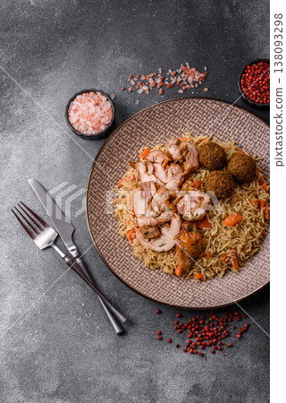 Kabsa or mandi, an Arabic dish with rice and chicken, salt, and spices. Kabsa or mandi 138093298