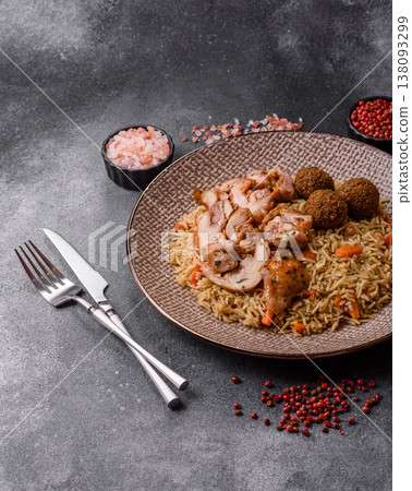 Kabsa or mandi, an Arabic dish with rice and chicken, salt, and spices. Kabsa or mandi 138093299