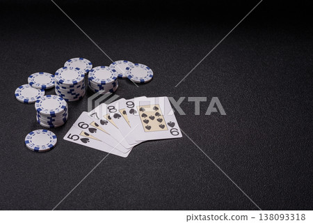 Playing cards and chips on a table, a gambling game of poker. Cards and chips Playing cards and chips on a table, a gambling game of poker. Cards and chips 138093318