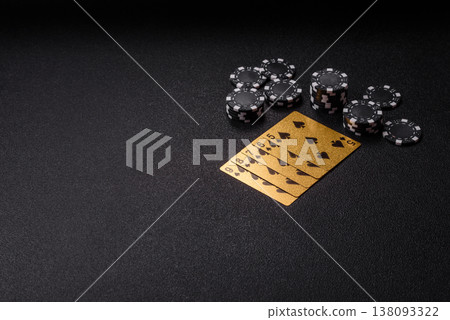 Playing cards and chips on a table, a gambling game of poker. Cards and chips Playing cards and chips on a table, a gambling game of poker. Cards and chips 138093322