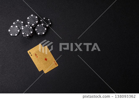 Playing cards and chips on a table, a gambling game of blackjack or baccarat. Cards and chips Playing cards and chips on a table, a gambling game of blackjack or baccarat. Cards and chips 138093362