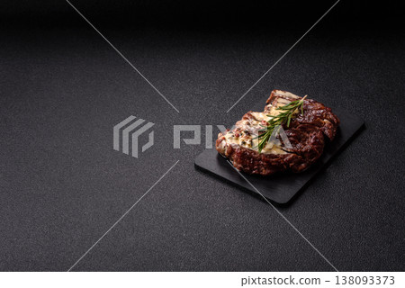 Steak, beef or pork meat grilled or barbecued with salt and spices. Beef steak Steak, beef or pork meat grilled or barbecued with salt and spices. Beef steak 138093373