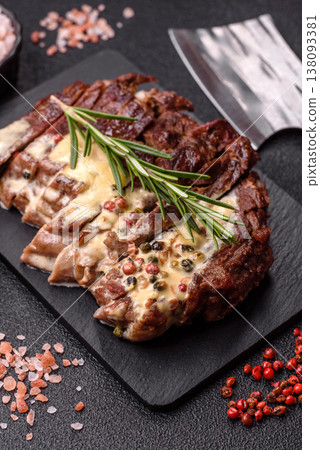 Steak, beef or pork meat grilled or barbecued with salt and spices. Beef steak Steak, beef or pork meat grilled or barbecued with salt and spices. Beef steak 138093381