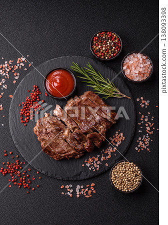 Steak, beef or pork meat grilled or barbecued with salt and spices. Beef steak 138093398