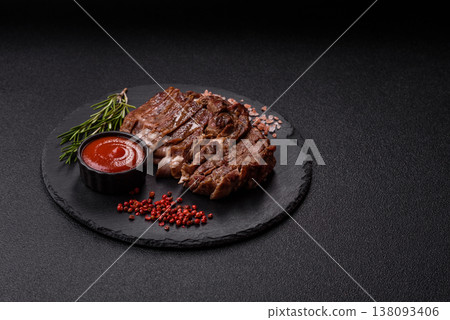 Steak, beef or pork meat grilled or barbecued with salt and spices. Beef steak Steak, beef or pork meat grilled or barbecued with salt and spices. Beef steak 138093406