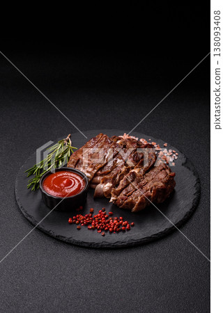 Steak, beef or pork meat grilled or barbecued with salt and spices. Beef steak 138093408