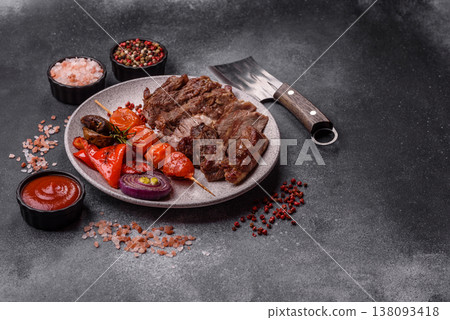 Steak, beef or pork meat grilled or barbecued with salt and spices. Beef steak Steak, beef or pork meat grilled or barbecued with salt and spices. Beef steak 138093418