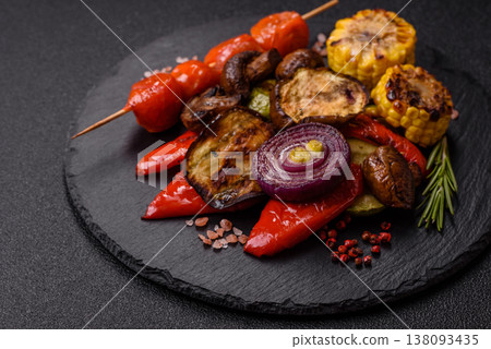 Grilled vegetables: bell peppers, zucchini, eggplant, onions, and corn. Grilled vegetables Grilled vegetables: bell peppers, zucchini, eggplant, onions, and corn. Grilled vegetables 138093435
