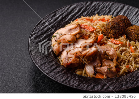Kabsa or mandi, an Arabic dish with rice and chicken, salt, and spices. Kabsa or mandi Kabsa or mandi, an Arabic dish with rice and chicken, salt, and spices. Kabsa or mandi 138093456