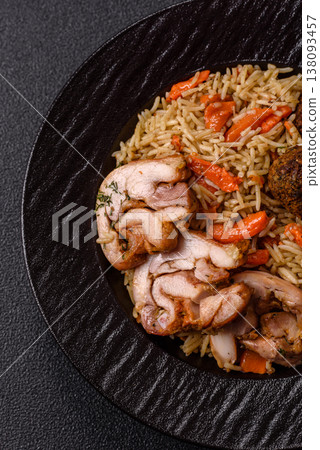 Kabsa or mandi, an Arabic dish with rice and chicken, salt, and spices. Kabsa or mandi 138093457