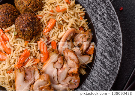 Kabsa or mandi, an Arabic dish with rice and chicken, salt, and spices. Kabsa or mandi 138093458