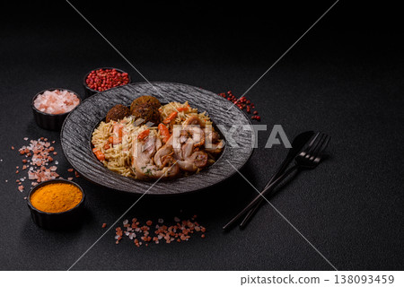 Kabsa or mandi, an Arabic dish with rice and chicken, salt, and spices. Kabsa or mandi Kabsa or mandi, an Arabic dish with rice and chicken, salt, and spices. Kabsa or mandi 138093459