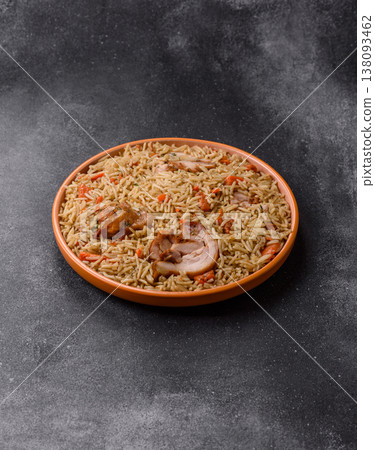 Kabsa or mandi, an Arabic dish with rice and chicken, salt, and spices. Kabsa or mandi 138093462