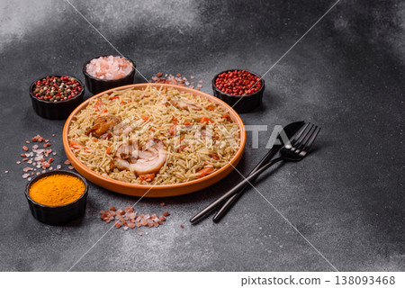 Kabsa or mandi, an Arabic dish with rice and chicken, salt, and spices. Kabsa or mandi 138093468