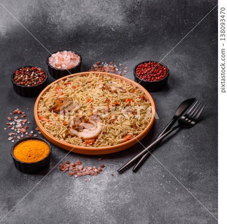 Kabsa or mandi, an Arabic dish with rice and chicken, salt, and spices. Kabsa or mandi Kabsa or mandi, an Arabic dish with rice and chicken, salt, and spices. Kabsa or mandi 138093470