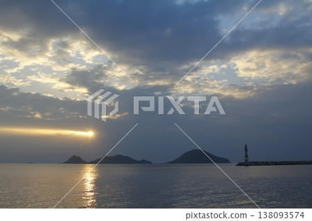Seascape at sunshine. Lighthouse and sailings on the coast. Seaside town of Turgutreis and spectacular sunshine 138093574