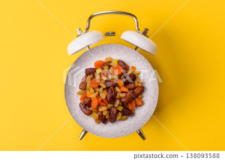 Dried apricots, raisins, and candied fruits as ingredients for baked goods and sweets. Dried fruits 138093588