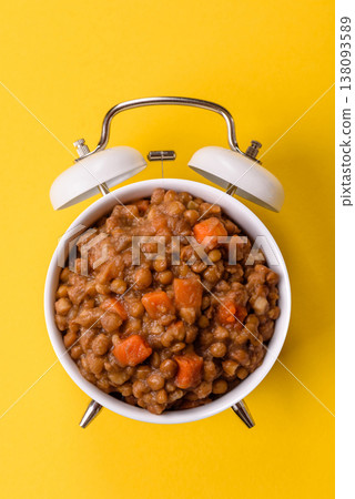 Lentil, carrot, and tomato stew with sausages, a European dish. Lentils with sausages Lentil, carrot, and tomato stew with sausages, a European dish. Lentils with sausages 138093589