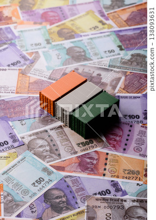 Cargo containers on the Indian money as a conceptual backdrop for goods export. Cargo containers 138093631