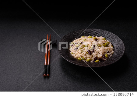 Asian food with rice, edamame, carrots, tofu, and spices. Rice with edamame 138093714