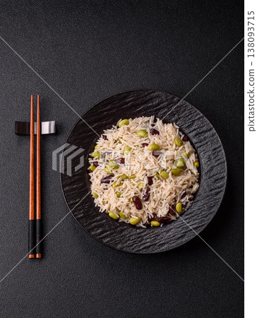Asian food with rice, edamame, carrots, tofu, and spices. Rice with edamame Asian food with rice, edamame, carrots, tofu, and spices. Rice with edamame 138093715