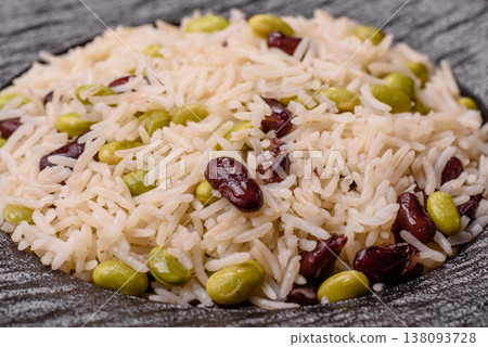 Asian food with rice, edamame, carrots, tofu, and spices. Rice with edamame Asian food with rice, edamame, carrots, tofu, and spices. Rice with edamame 138093728