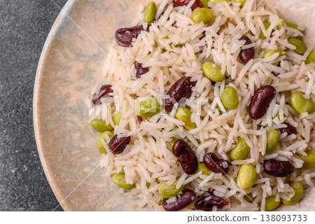Asian food with rice, edamame, carrots, tofu, and spices. Rice with edamame Asian food with rice, edamame, carrots, tofu, and spices. Rice with edamame 138093733