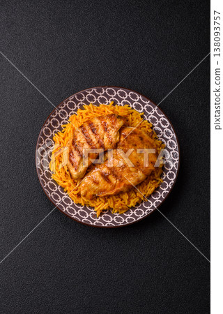 Kabsa or haneeth, an Arabic dish with rice and chicken, salt, and spices. Kabsa or haneeth Kabsa or haneeth, an Arabic dish with rice and chicken, salt, and spices. Kabsa or haneeth 138093757