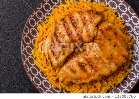 Kabsa or haneeth, an Arabic dish with rice and chicken, salt, and spices. Kabsa or haneeth Kabsa or haneeth, an Arabic dish with rice and chicken, salt, and spices. Kabsa or haneeth 138093760