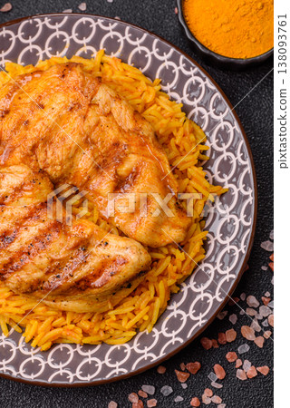 Kabsa or haneeth, an Arabic dish with rice and chicken, salt, and spices. Kabsa or haneeth 138093761