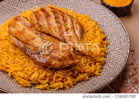 Kabsa or haneeth, an Arabic dish with rice and chicken, salt, and spices. Kabsa or haneeth 138093780