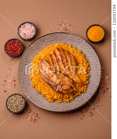 Kabsa or haneeth, an Arabic dish with rice and chicken, salt, and spices. Kabsa or haneeth 138093784