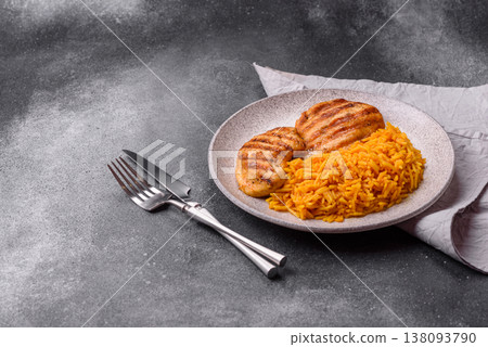 Dajaj Mashwi, an Arabic dish with rice and chicken, salt, and spices. Dajaj Mashwi as a background Dajaj Mashwi, an Arabic dish with rice and chicken, salt, and spices. Dajaj Mashwi as a background 138093790
