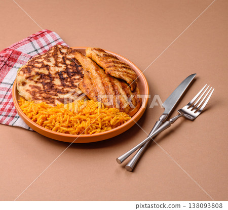 Dajaj Mashwi, an Arabic dish with rice and chicken, salt, and spices. Dajaj Mashwi as a background 138093808