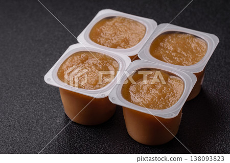 Apple sweet sauce, baby food, canned ingredient for desserts. Apple sauce Apple sweet sauce, baby food, canned ingredient for desserts. Apple sauce 138093823