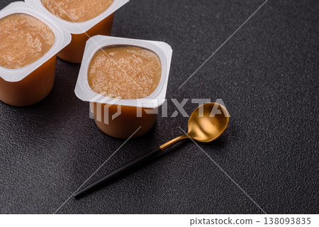 Apple sweet sauce, baby food, canned ingredient for desserts. Apple sauce 138093835