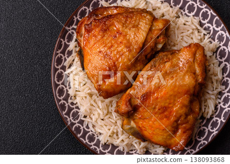 Kabsa or haneeth, an Arabic dish with rice and chicken, salt, and spices. Kabsa or haneeth Kabsa or haneeth, an Arabic dish with rice and chicken, salt, and spices. Kabsa or haneeth 138093868
