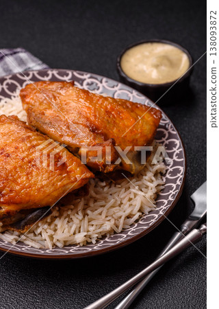 Kabsa or haneeth, an Arabic dish with rice and chicken, salt, and spices. Kabsa or haneeth 138093872