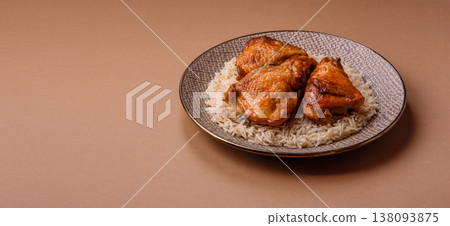 Kabsa or haneeth, an Arabic dish with rice and chicken, salt, and spices. Kabsa or haneeth 138093875