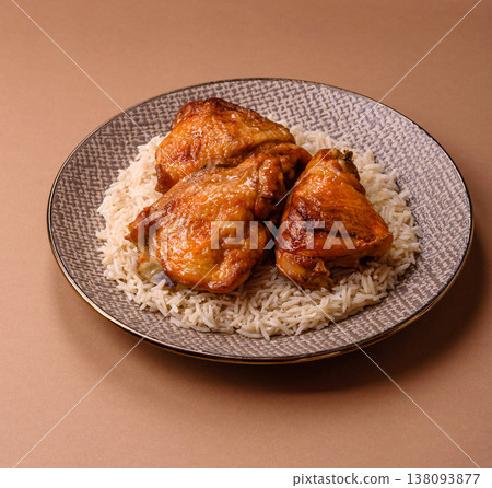 Kabsa or haneeth, an Arabic dish with rice and chicken, salt, and spices. Kabsa or haneeth 138093877