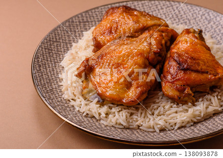 Kabsa or haneeth, an Arabic dish with rice and chicken, salt, and spices. Kabsa or haneeth Kabsa or haneeth, an Arabic dish with rice and chicken, salt, and spices. Kabsa or haneeth 138093878