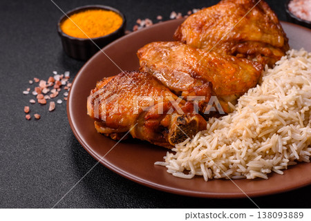 Kabsa or haneeth, an Arabic dish with rice and chicken, salt, and spices. Kabsa or haneeth 138093889