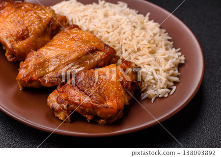 Kabsa or haneeth, an Arabic dish with rice and chicken, salt, and spices. Kabsa or haneeth Kabsa or haneeth, an Arabic dish with rice and chicken, salt, and spices. Kabsa or haneeth 138093892