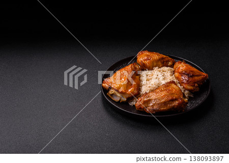 Kabsa or haneeth, an Arabic dish with rice and chicken, salt, and spices. Kabsa or haneeth 138093897