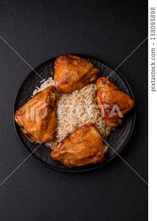Kabsa or haneeth, an Arabic dish with rice and chicken, salt, and spices. Kabsa or haneeth Kabsa or haneeth, an Arabic dish with rice and chicken, salt, and spices. Kabsa or haneeth 138093898